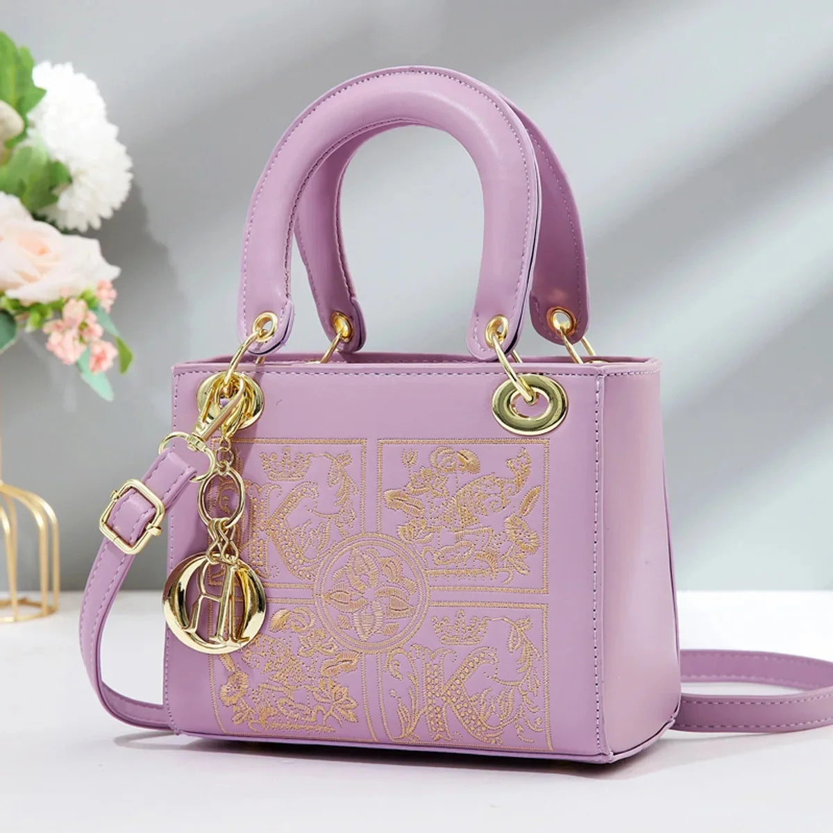 Embroidered Satchel With Gold Hardware Charm Detail