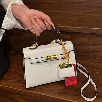 Lockable Satchel With Charm Pouch And Chain Accent Pro