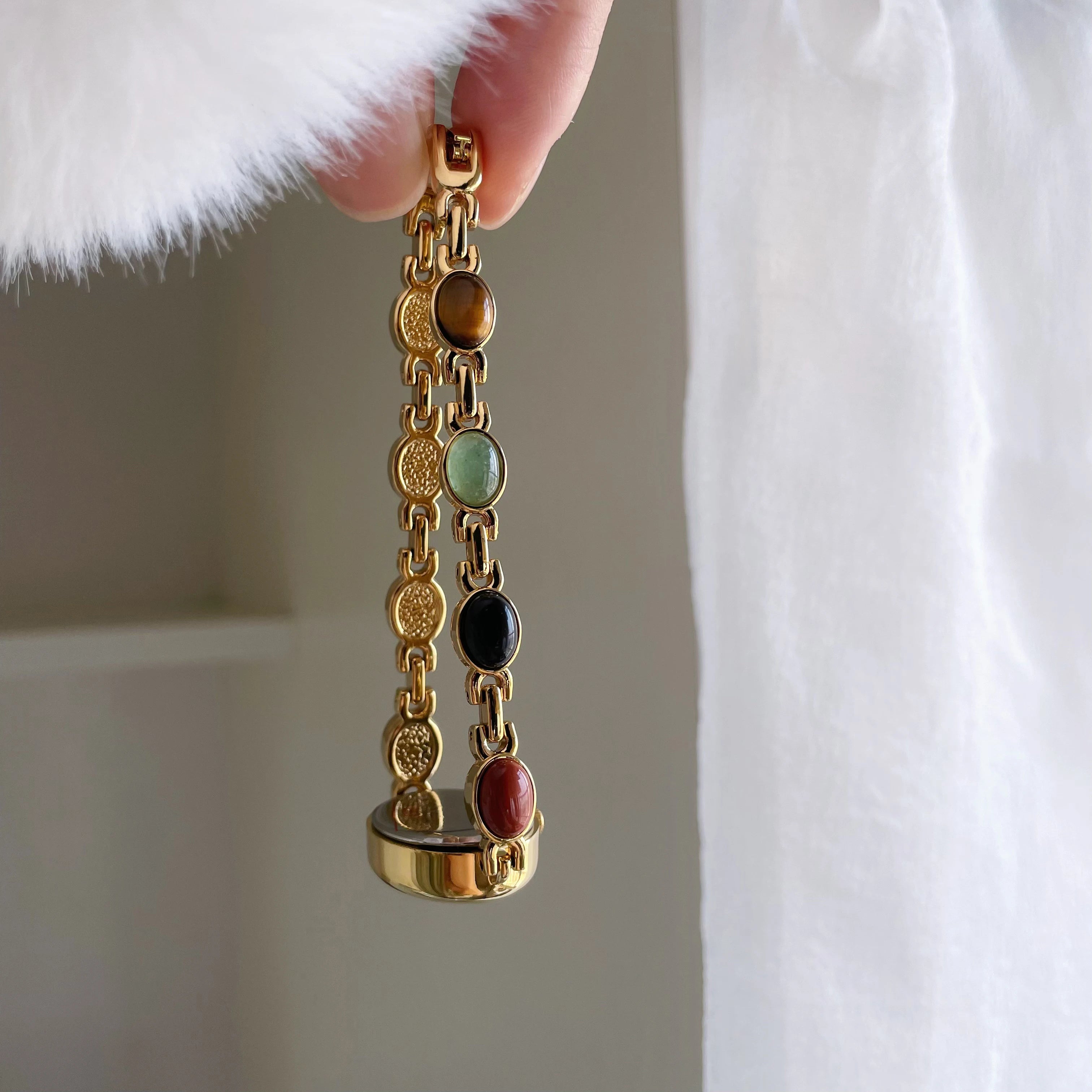 Elegant Oval Face Watch with Gemstone Bracelet