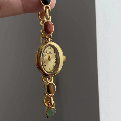 Elegant Oval Face Watch with Gemstone Bracelet