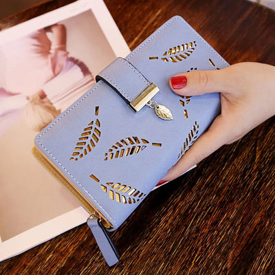 Leaf Motif Zip Wallet with Metallic Clasp and Charm