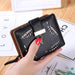Leafcut Delicate Wallet With Strap Clasp And Charm - Black