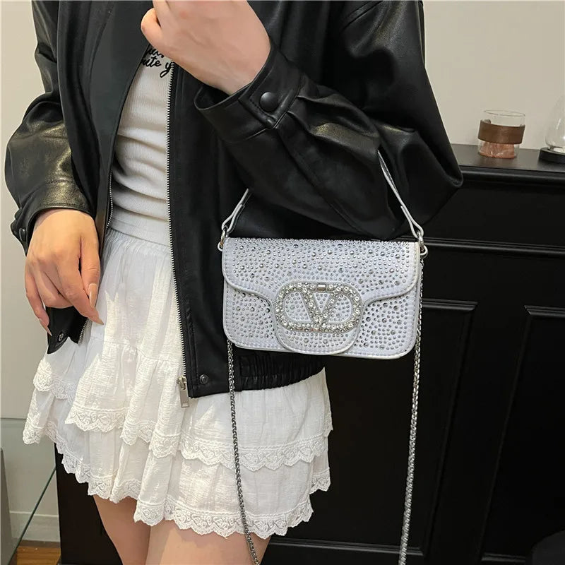 Parisian Bejeweled Crossbody Bag with Emblem Clasp