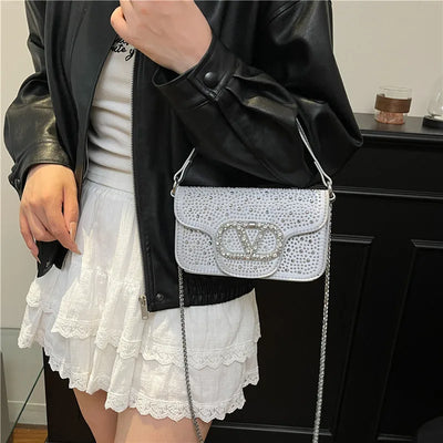 Parisian Bejeweled Crossbody Bag with Emblem Clasp