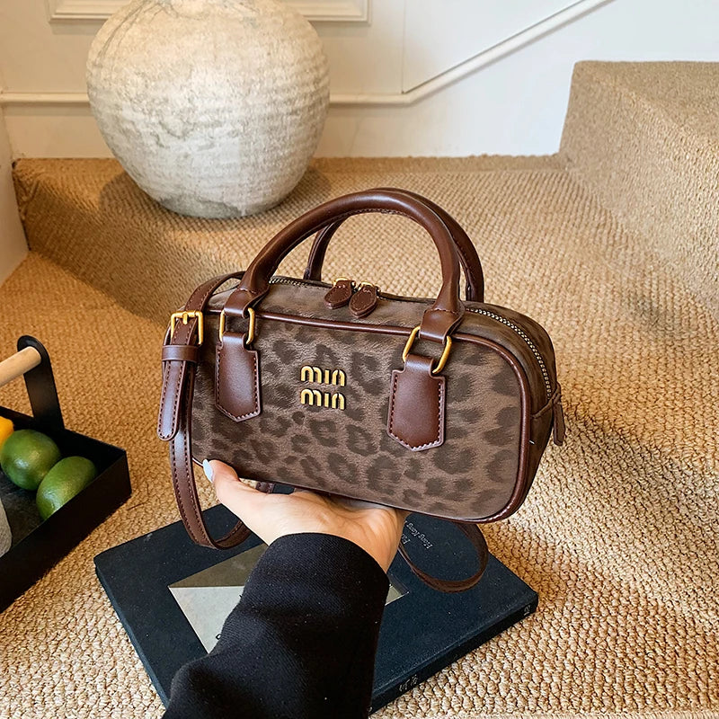Leopard Bowler Bag With Gold Hardware And Top Handles