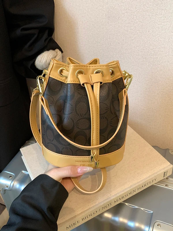Retro Commuter Bucket Bag With Drawstring Elegance