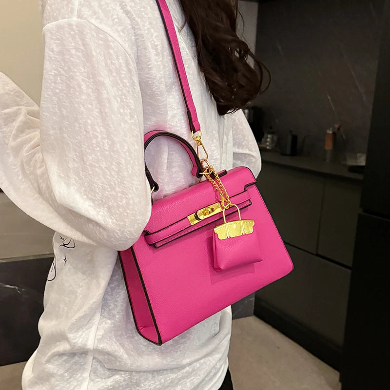 Lockable Satchel With Charm Pouch And Chain Accent Pro