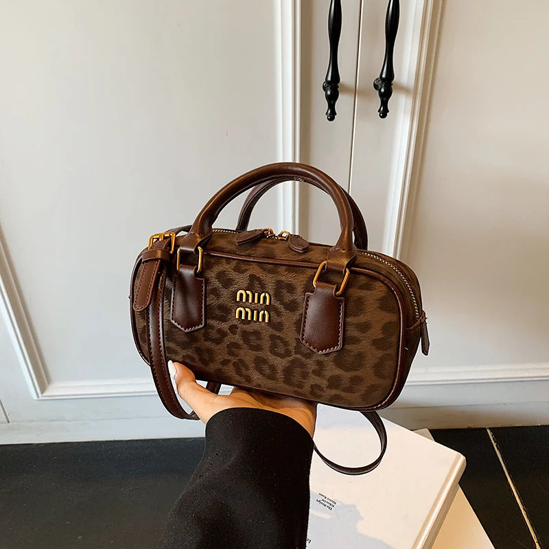 Leopard Bowler Bag With Gold Hardware And Top Handles
