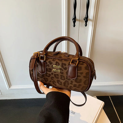 Leopard Bowler Bag With Gold Hardware And Top Handles