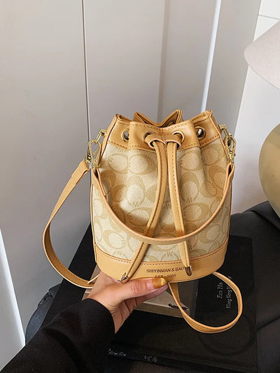 Retro Commuter Bucket Bag With Drawstring Elegance