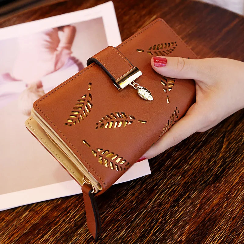 Leaf Motif Zip Wallet with Metallic Clasp and Charm