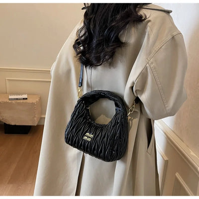 Quilted Wave Crossbody Bag With Delicate Logo Detailing