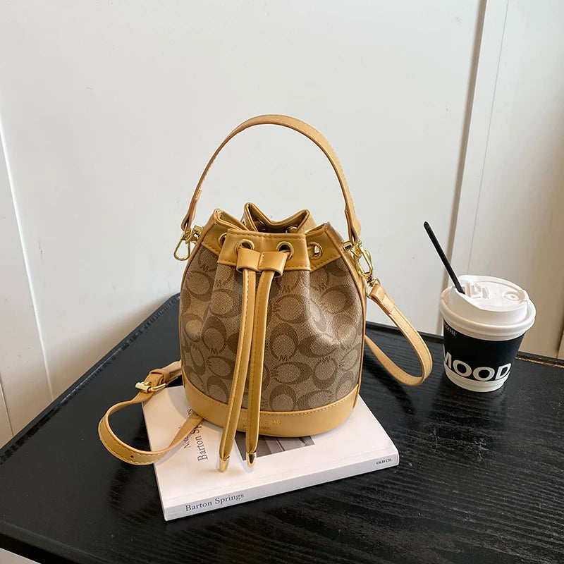 Retro Commuter Bucket Bag With Drawstring Elegance