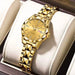 Watch With Diamond Markers And Faceted Bezel Details - Gold