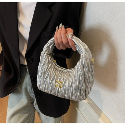 Quilted Wave Crossbody Bag With Delicate Logo Detailing