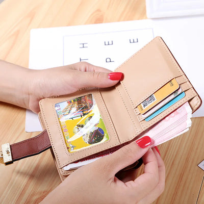 Leafcut Delicate Wallet With Strap Clasp And Charm