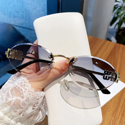 Oval Frame Sunglasses with Rimless Edge and Gold Accent - WO2MEN