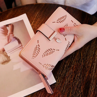 Leaf Motif Zip Wallet with Metallic Clasp and Charm