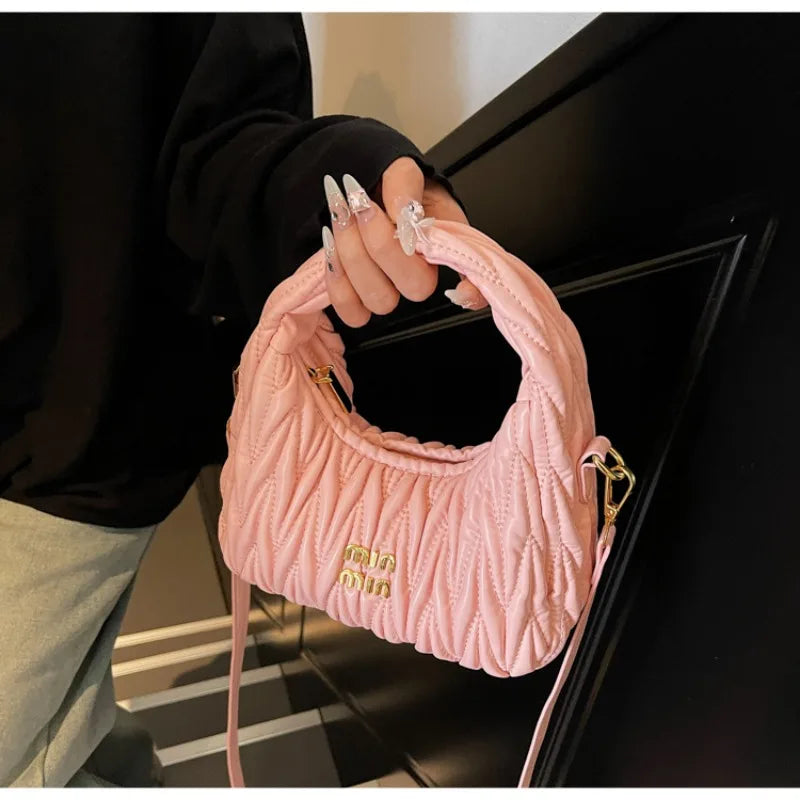 Quilted Wave Crossbody Bag With Delicate Logo Detailing