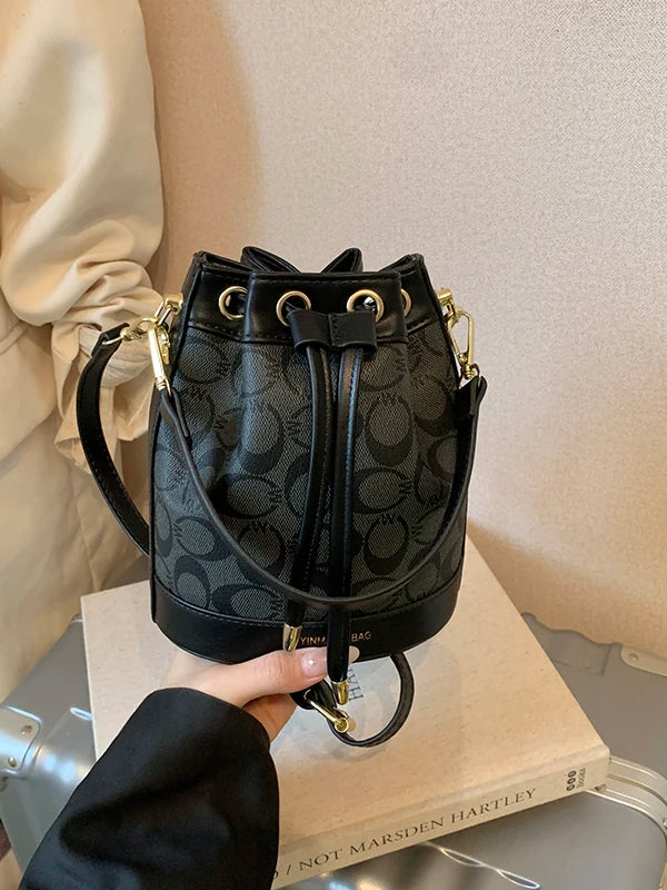 Retro Commuter Bucket Bag With Drawstring Elegance