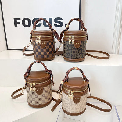 Bucket Bag With Monogram Pattern And Leather Trim Charm
