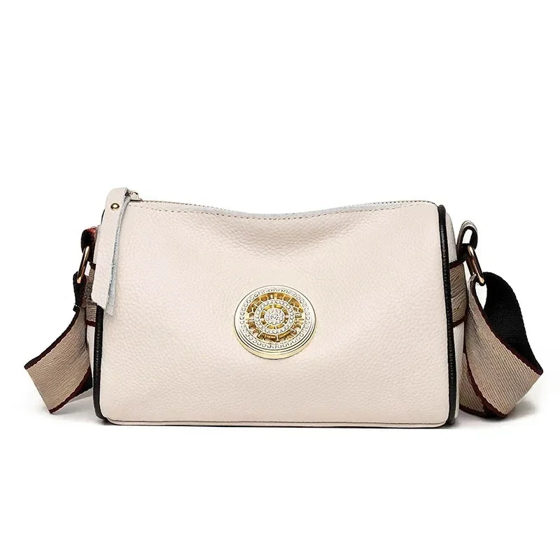 Emblem Crossbody Bag With Wide Strap And Circular Clasp