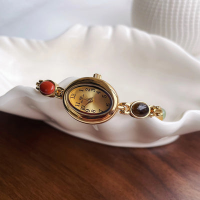Elegant Oval Face Watch with Gemstone Bracelet