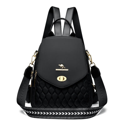 Backpack With Quilted Front Panel And Metal Hardware