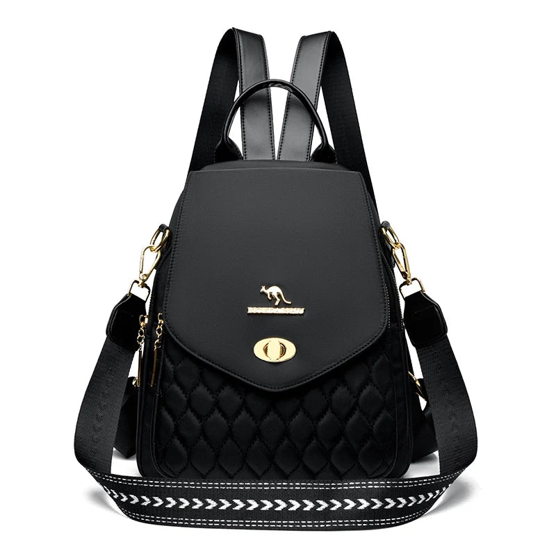 Backpack With Quilted Front Panel And Metal Hardware