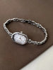 Oval Dial Quartz Watch with Bracelet Style Accessory - Nineteen