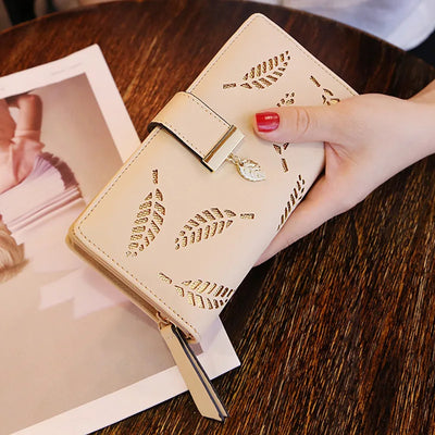 Leaf Motif Zip Wallet with Metallic Clasp and Charm