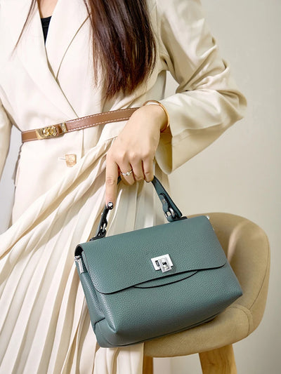 Enveloped Top Handle Bag With Classic Metal Clasp Charm