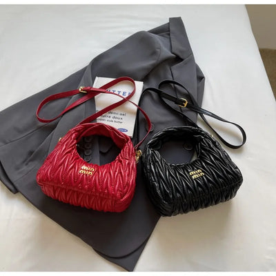 Quilted Wave Crossbody Bag With Delicate Logo Detailing