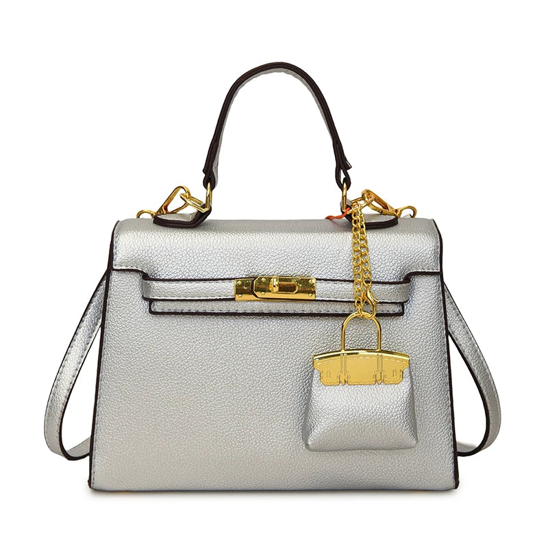 Lockable Satchel With Charm Pouch And Chain Accent Pro