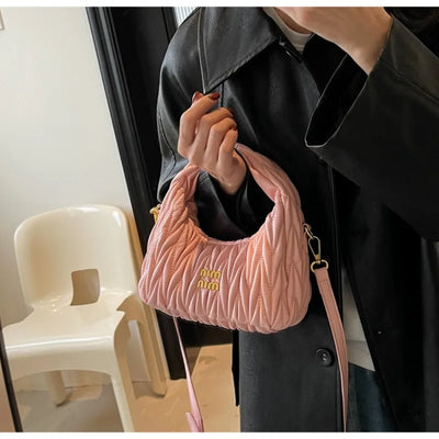 Quilted Wave Crossbody Bag With Delicate Logo Detailing