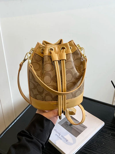 Retro Commuter Bucket Bag With Drawstring Elegance