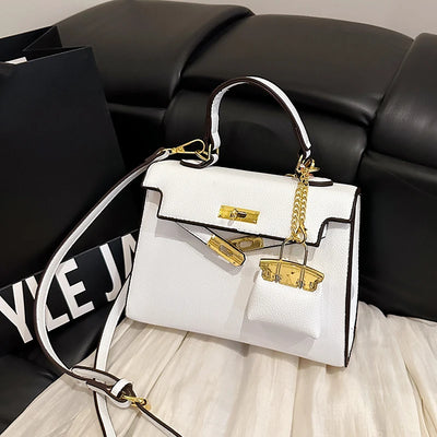 Lockable Satchel With Charm Pouch And Chain Accent Pro