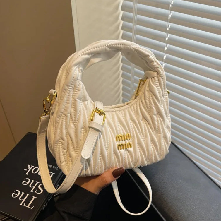 Quilted Wave Crossbody Bag With Delicate Logo Detailing