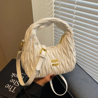 Quilted Wave Crossbody Bag With Delicate Logo Detailing