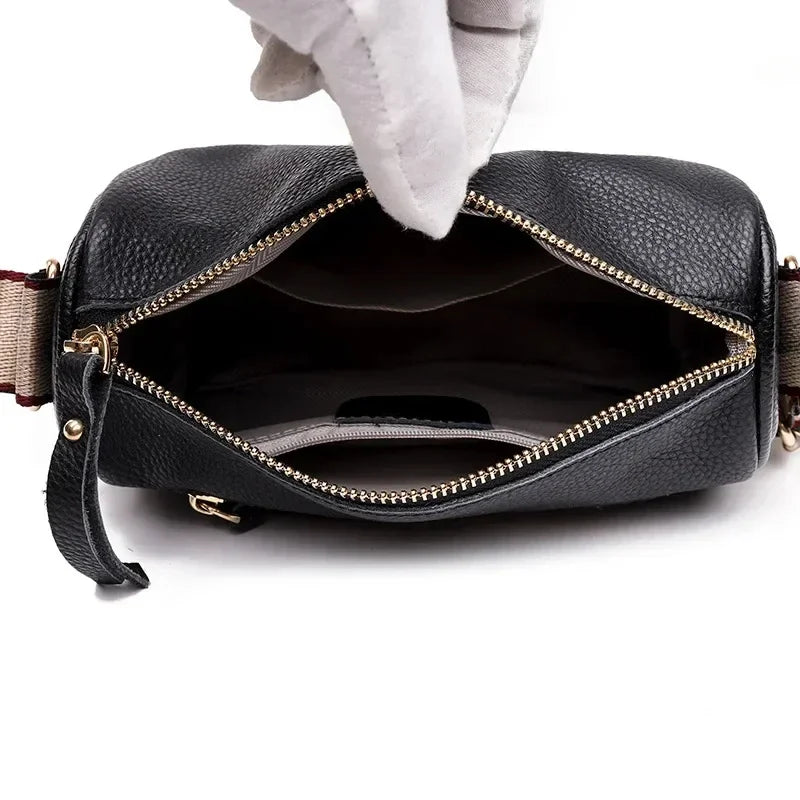 Emblem Crossbody Bag With Wide Strap And Circular Clasp