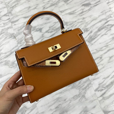 Patchwork Lock Crossbody Bag With Structured Handle