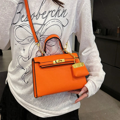 Lockable Satchel With Charm Pouch And Chain Accent Pro