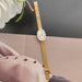 Classic Oval Case Quartz Watch with Slim Bracelet - Gold