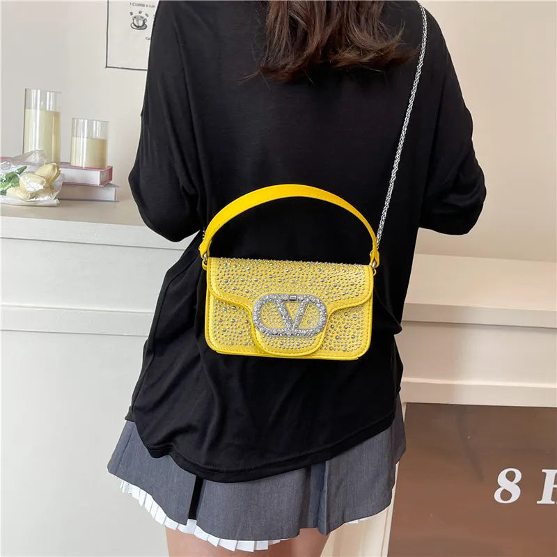 Parisian Bejeweled Crossbody Bag with Emblem Clasp