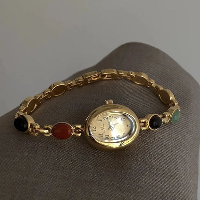 Elegant Oval Face Watch with Gemstone Bracelet