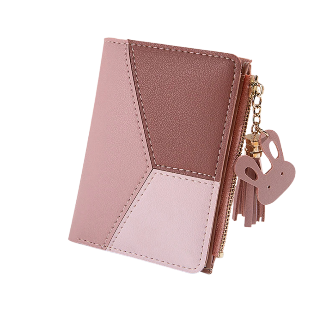 Pink and brown wallet with a keychain on a white background